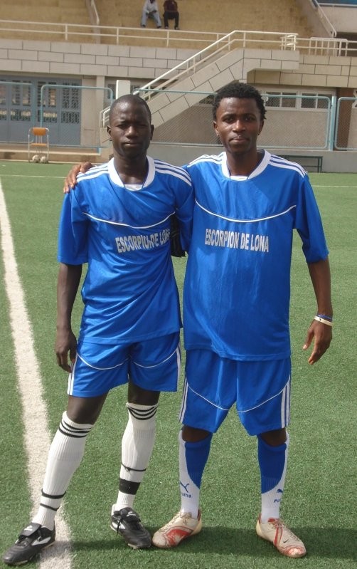 Ibntawel with his freind on the field IDRISSA