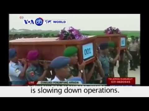 Coffins carrying AirAsia crash victims arrive in Surabaya- VOA60 World