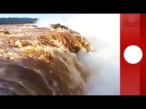 Intense flooding turns scenic IguazuÂ Falls into water inferno