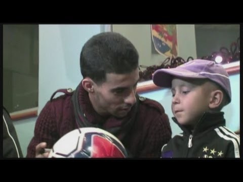 Mbark Boussoufa visits hospital for children with cancer