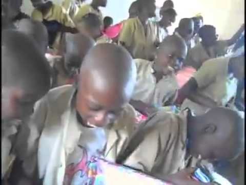 90 seconds of joy - Children in Burundi opening donated shoeboxes filled wi
