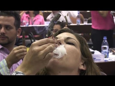 Cigar lovers compete for longest ash prize in Cuba