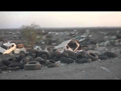 Trash-strewn roadside view just outside Djibouti City
