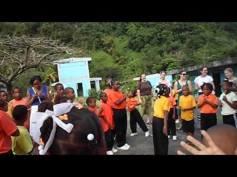 School children singing and dancing in Dominica