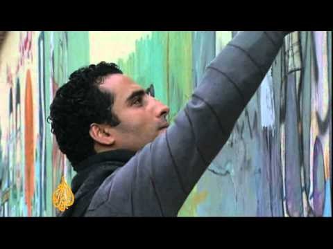 Artists use graffiti to tell Egypt revolution's stories
