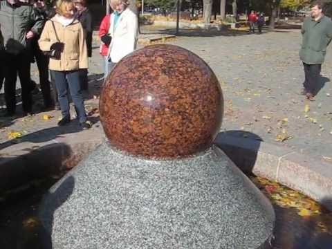 Interesting fountain with rotating granite sphere in Tampere