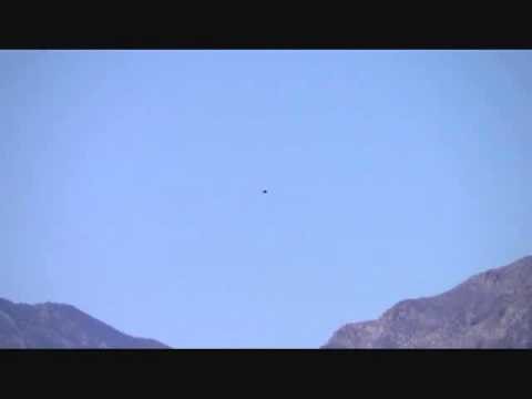 UFO shaped like helicopter has orb circling it! IS THIS REALLY A HELICOPTER
