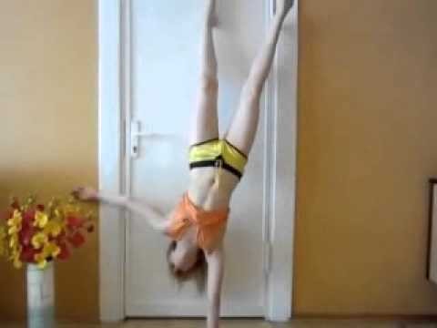 flexible gymnastic girl Fitness girl standing on hands Flexible and Elastic
