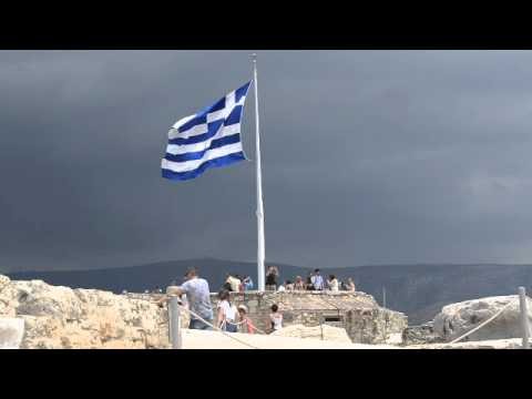 Flag of Greece waving in the Acropolis