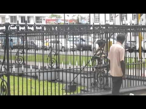 Homeless Guy Shaking His Penis at Government Worker in Guyana