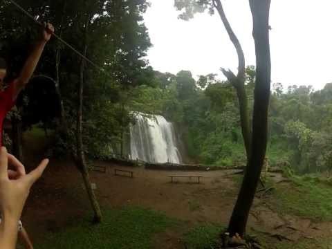 Zip Lining over the waterfall Pulhapanzak Honduras