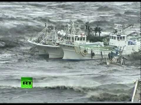 Video of mad tsunami waves battering ships, homes, cars after Japan earthqu