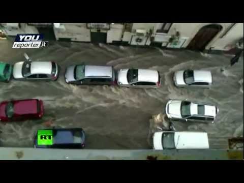 Flood video: Streets turned into rivers as heavy rains swamp Italy & Greece