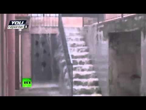 FLOOD video_ Streets turned into rivers as heavy rains swamp Italy & Greece