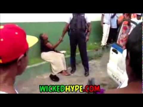 Police Officer Tries To Arrest Old Lady For Selling Ackee On The Street