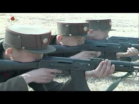 State TV shows North Korean soldiers shooting at a