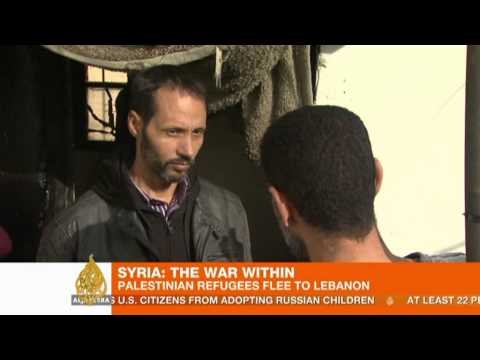Syrian refugees escaping violence flee to Lebanon