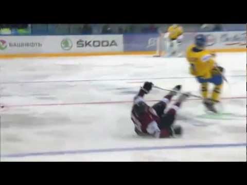 WJC - Tom Nilsson Huge hit on Nikita Jevpalovs. Dec 29th 2012