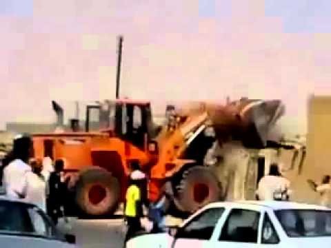 Libya -  NATO Rebels/Rats bulldoze houses belonging to the Tuareg berbers.