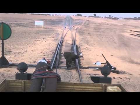 Mauritania repair car assistant aligning tracks