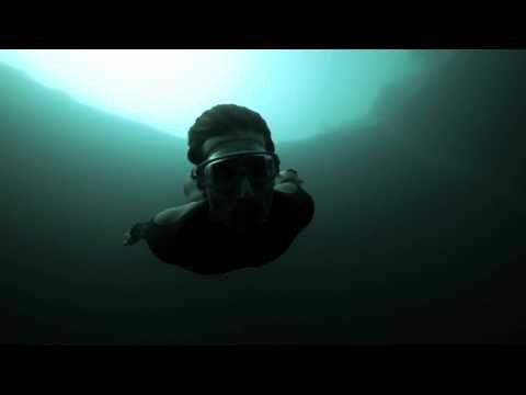 Guillaume Nery base jumping at Dean's Blue Hole, filmed on breath hold 