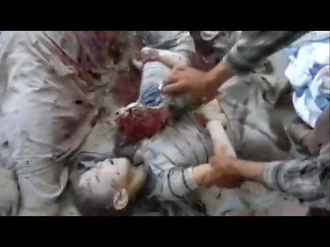 Syria+18Homs-martyrs children and their mother due to the massacre  committ