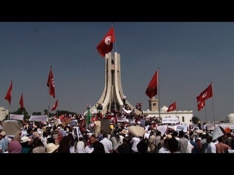 Thousands rally to demand 'cleansing' of Tunisia