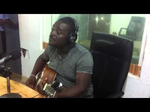 Kumi Guitar sings acoustic version of 'Scriptures' featuring Kwabena Kwaben